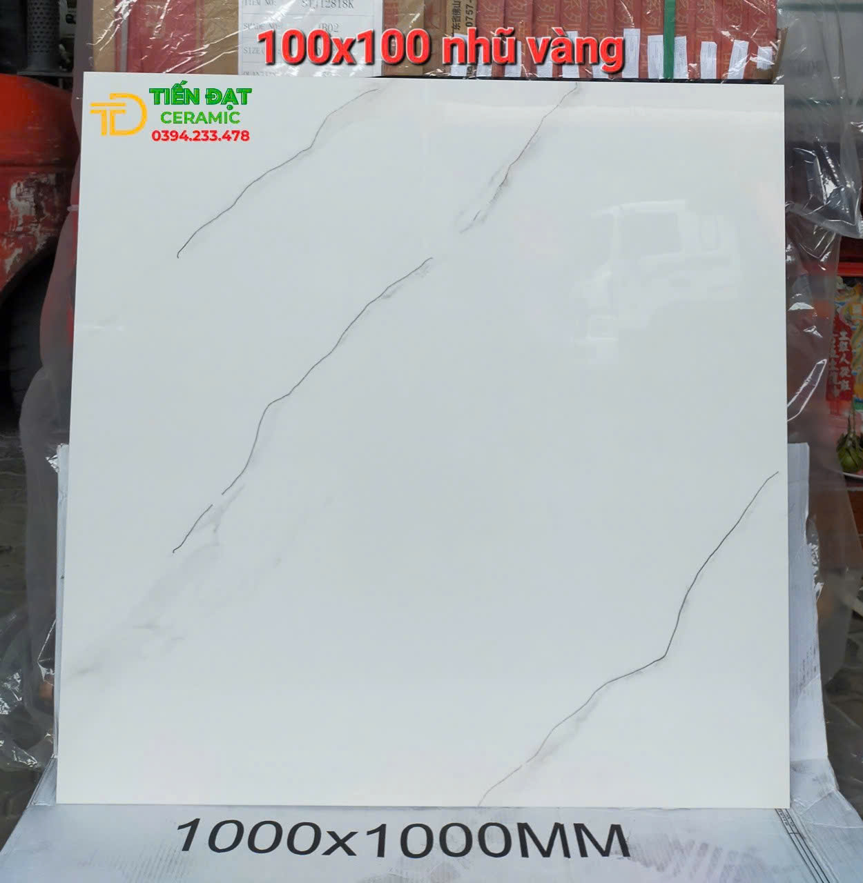 Gạch Cao Cấp TQ 100x100 Trắng Nhũ Vàng Lát Phòng khách