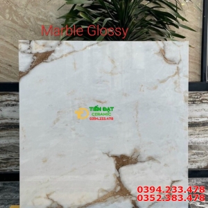 Gạch Ốp Lát Bóng Kiếng 100x100 Vân Vàng Nhạt 