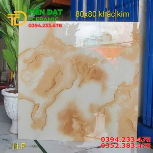 Đá Đồng Chất 80x80 Trắng Vân Vàng Khắc Kim