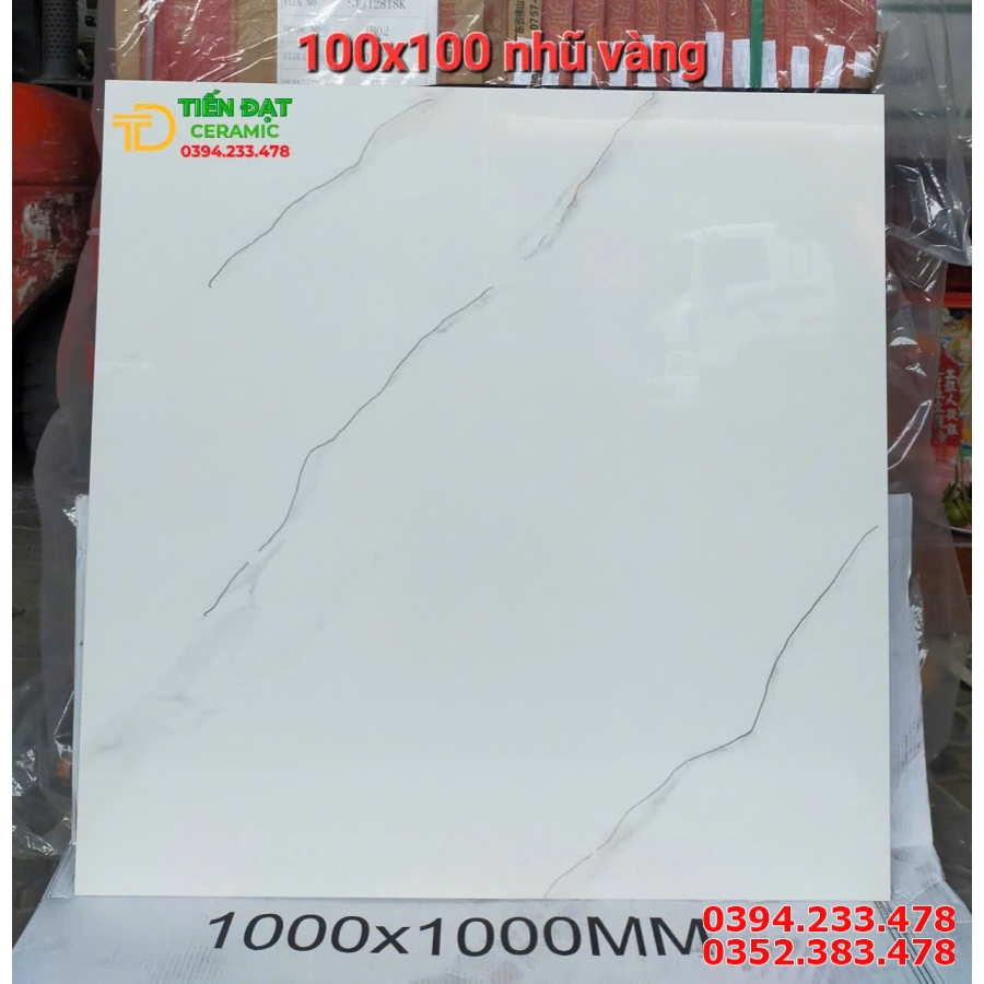 Gạch Cao Cấp TQ 100x100 Trắng Nhũ Vàng Lát Phòng Khách